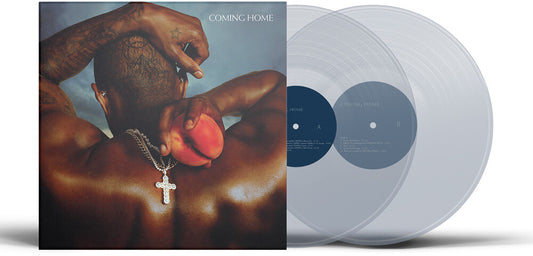 the album cover for USHER - Coming Home - Clear (Bonus Track) [Clear Vinyl] [Reissue]