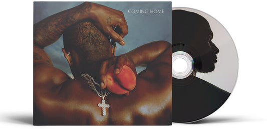 the album cover for USHER - Coming Home (Bonus Track) [Reissue]