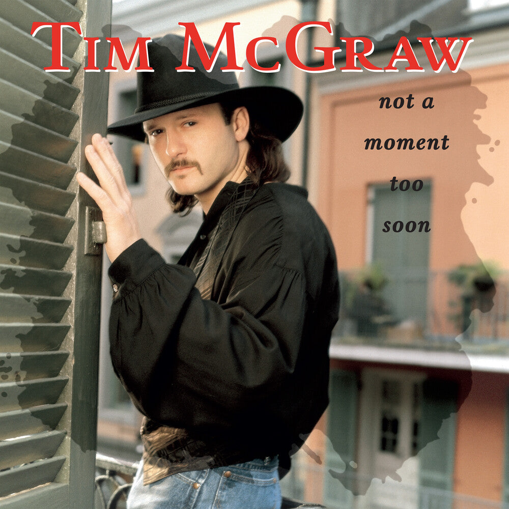 the album cover for McGraw, Tim - Not A Moment Too Soon (30th Anniversary)