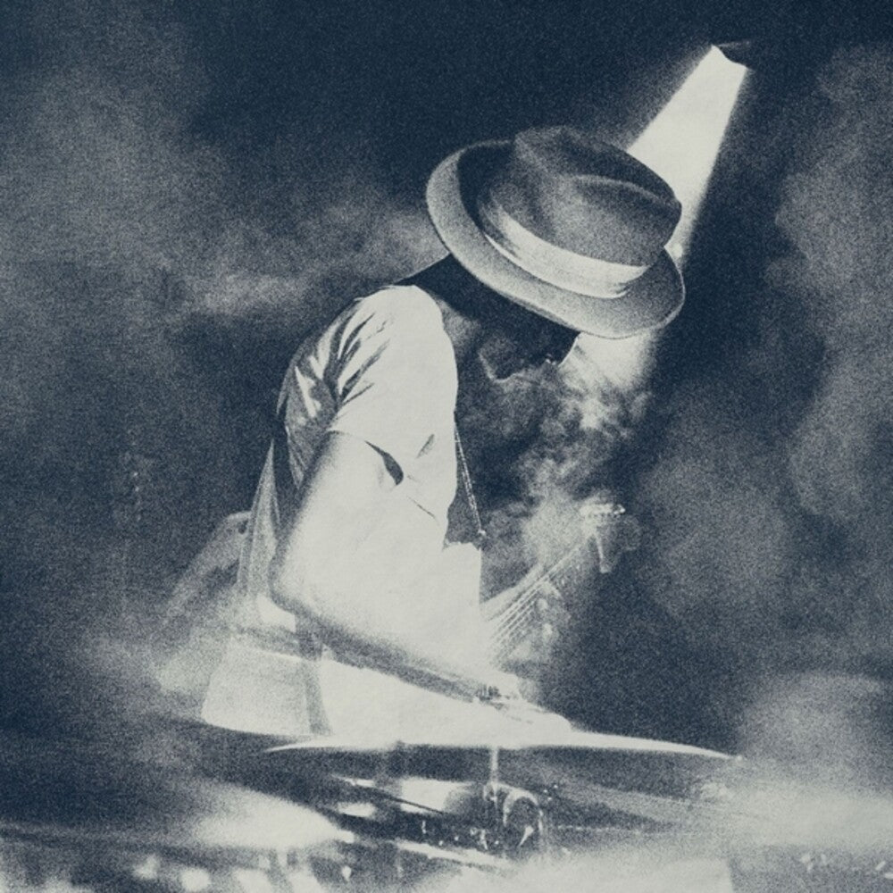 the album cover for Keziah Jones - Alive & Kicking: Live