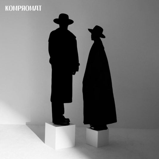 the album cover for Kompromat - Playing / Praying (Uk)