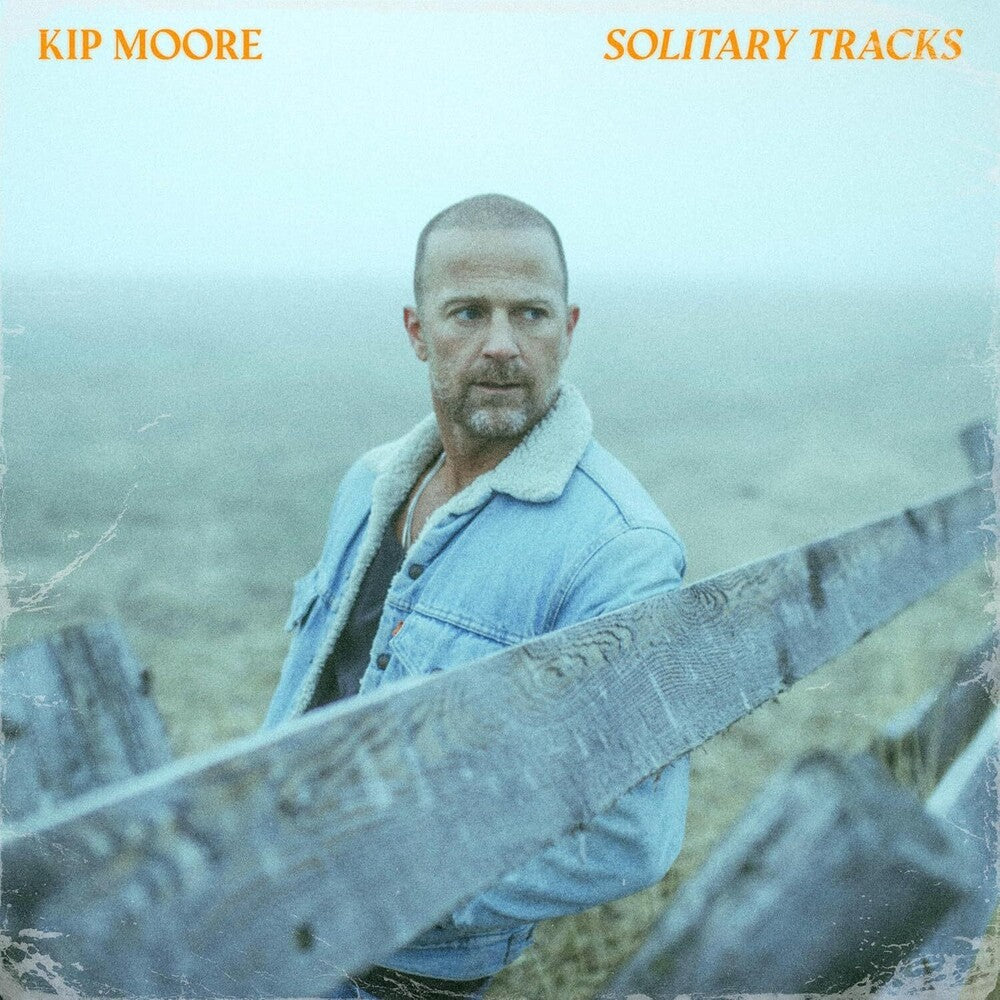 the album cover for Kip Moore - Solitary Tracks [Citrus Eco-Mix]