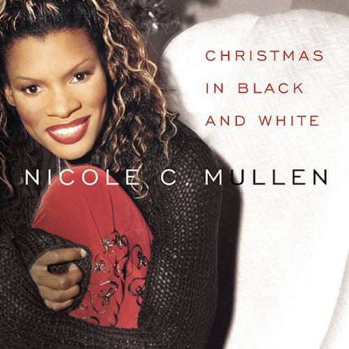 the album cover for Nicole Mullen - Christmas In Black and White