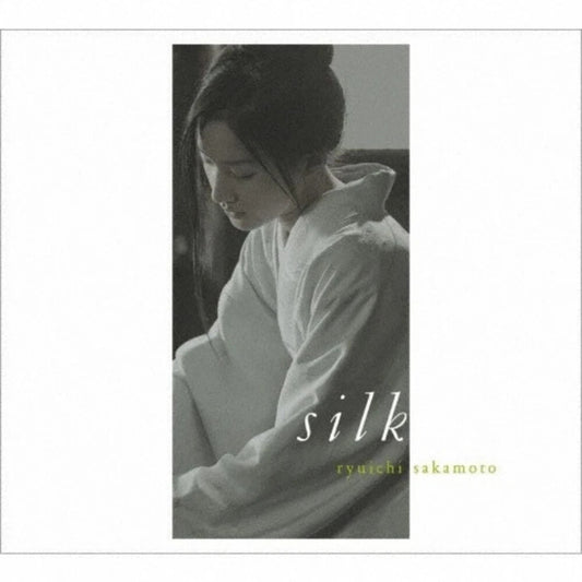 the album cover for Ryuichi Sakamoto  (Jpn) - Silk - O.S.T. (Jpn)