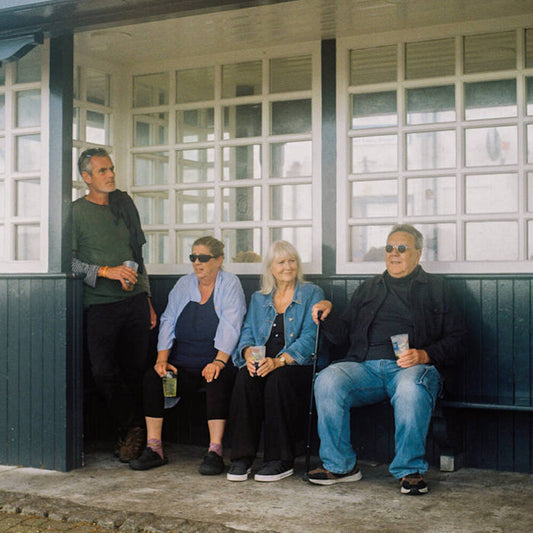 the album cover for Getdown Services - Your Medal's In The Post / Primordial Slot Machine