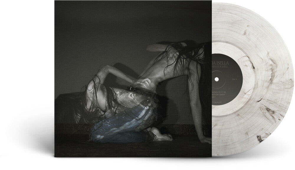 the album cover for Sofia Isella - Something Is A Shell . [Indie Exclusive] [Clear Vinyl] [Indie Exclusive]