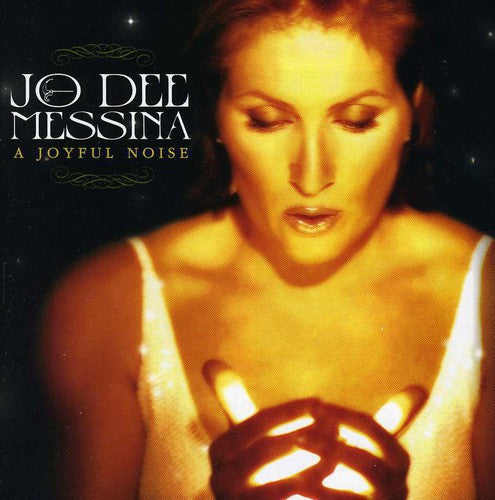 the album cover for Jo Dee Messina - A Joyful Noise