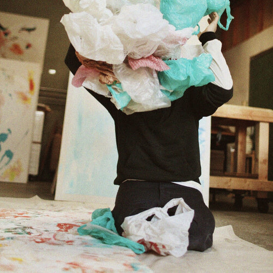 the album cover for Pluralone - Drop In The Ocean