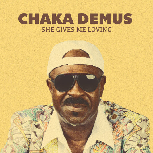 the album cover for Chaka Demus - She Gives Me Loving (Mod)