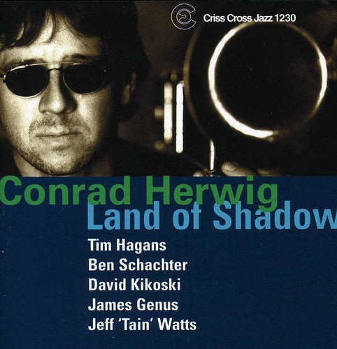 the album cover for Conrad Herwig - Land of Shadow