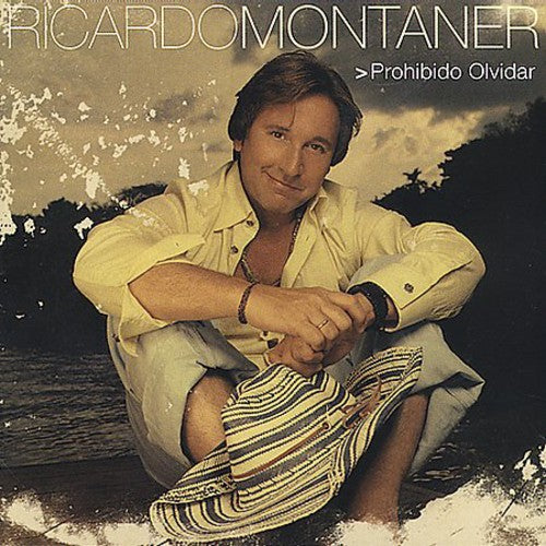 the album cover for Ricardo Montaner - Prohibido Olvidar