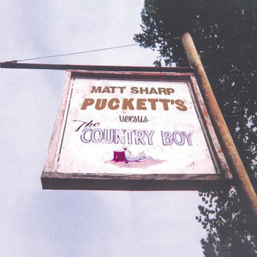 the album cover for Matt Sharp - Puckett's Versus the Country Boy