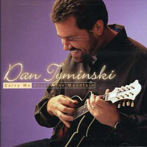 the album cover for Dan Tyminski - Carry Me Across the Mountain