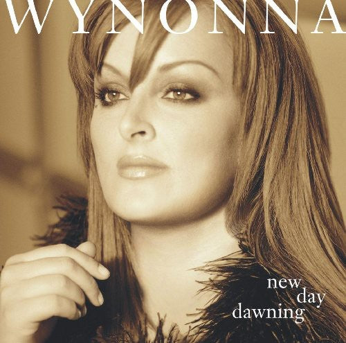 the album cover for Wynonna Judd - New Day Dawning