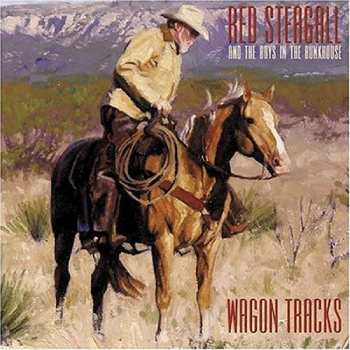 the album cover for Red Steagall - Wagon Tracks