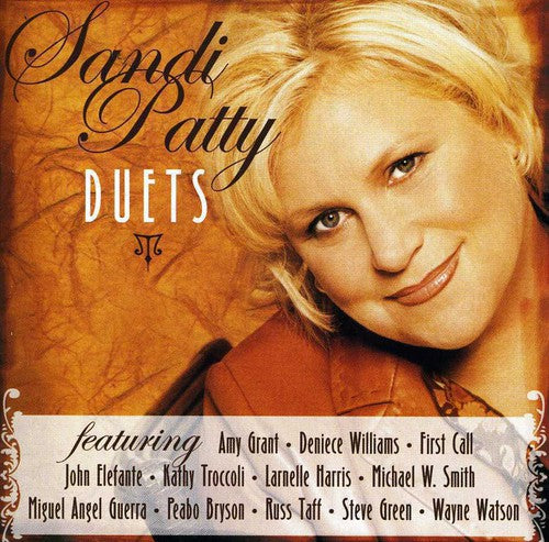 the album cover for Sandi Patty - Duets