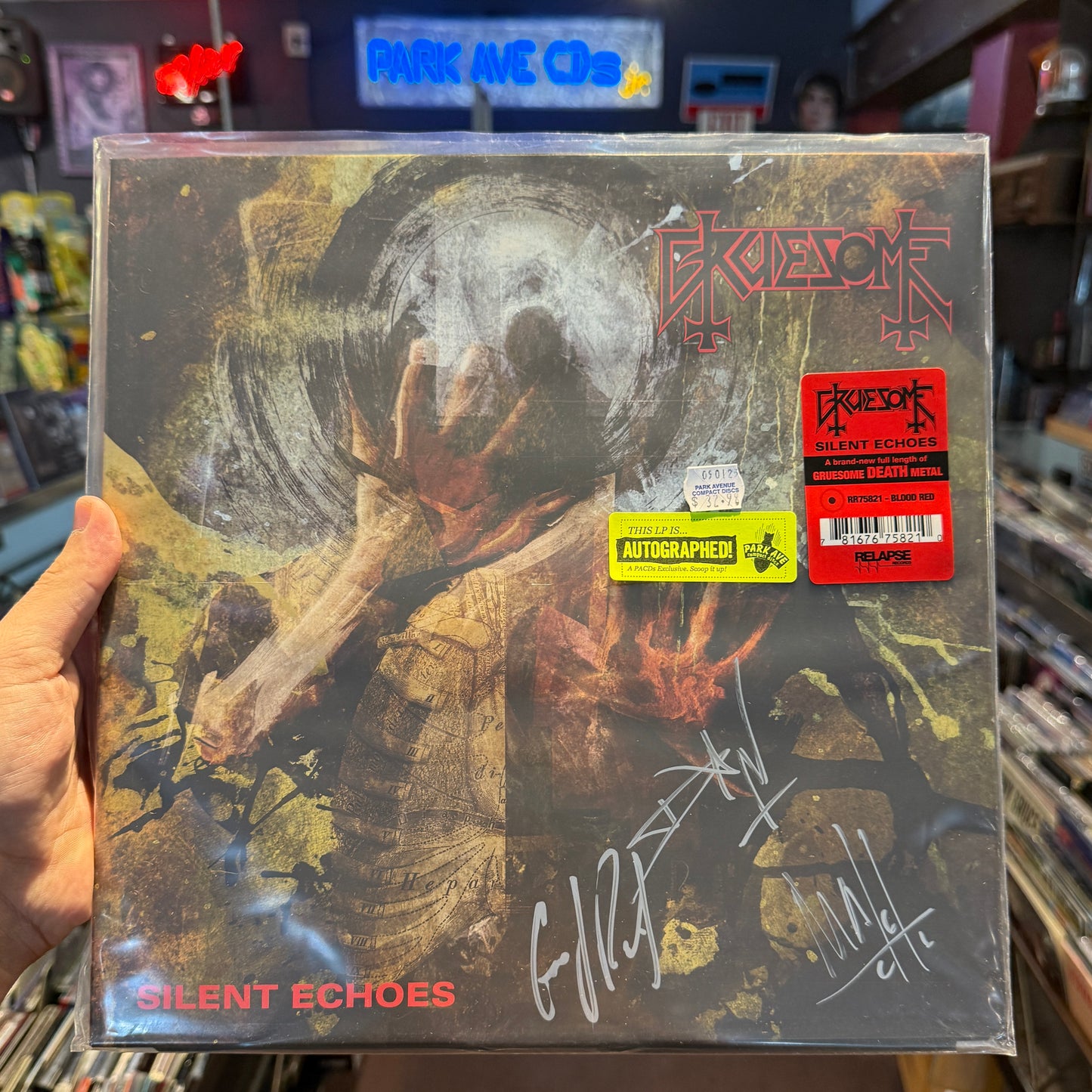 Signed copy of Gruesome - Silent Echoes on Blood Red vinyl