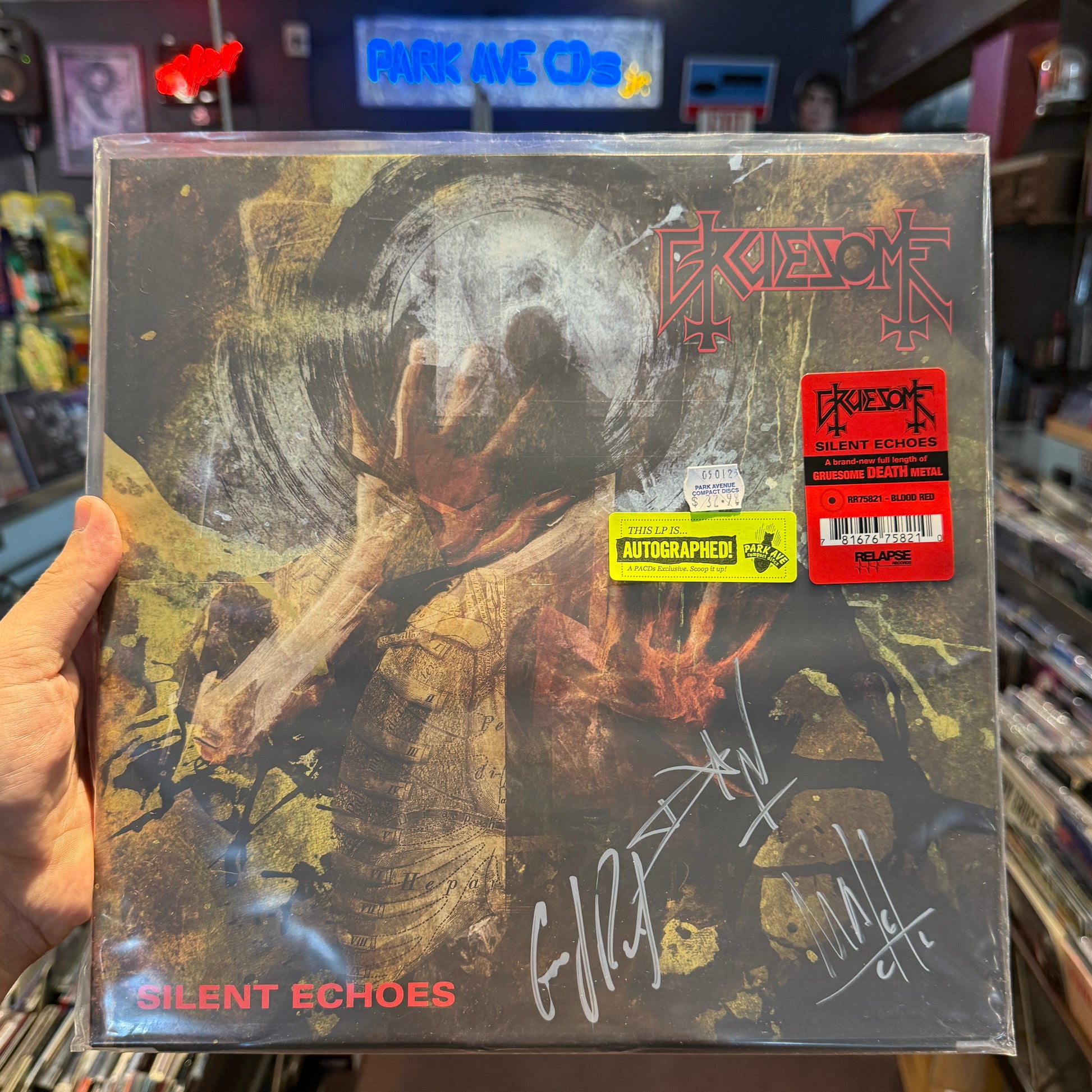 Signed copy of Gruesome - Silent Echoes on Blood Red vinyl