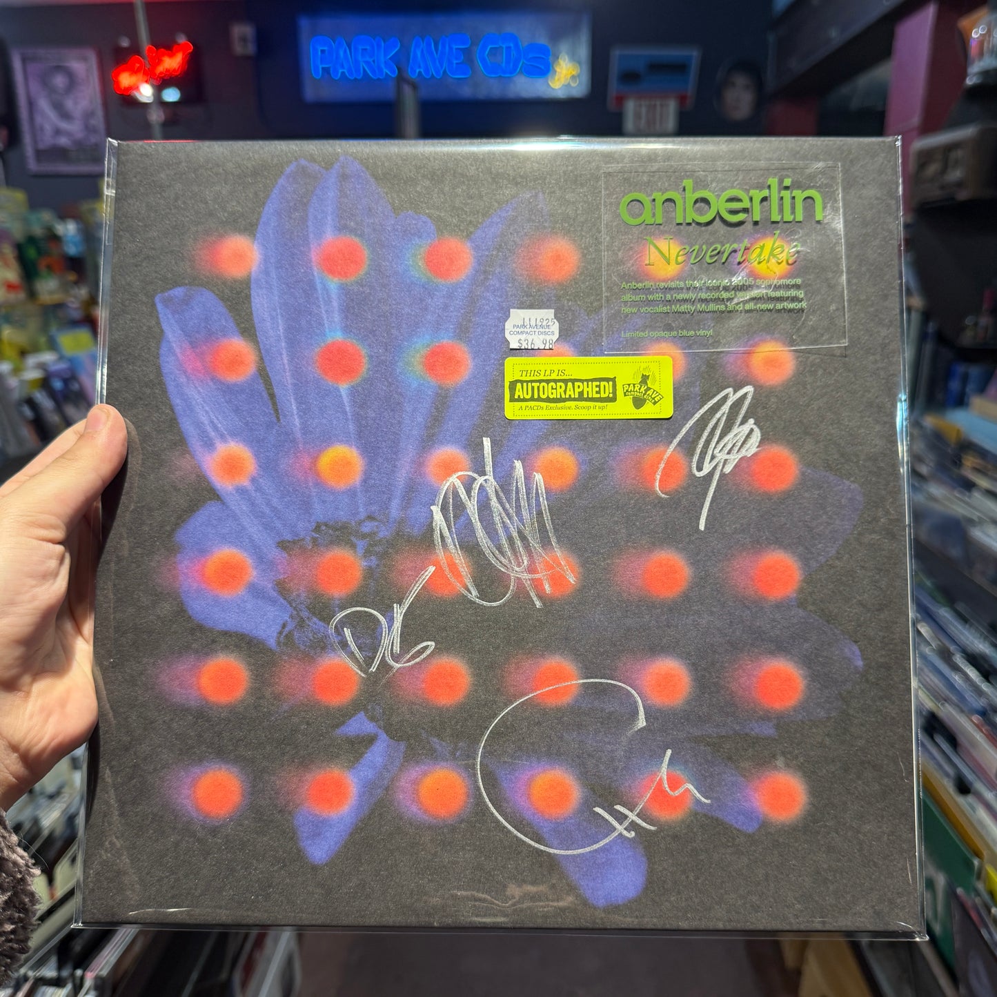 The album cover for Anberlin - Nevertake [Park Ave SIGNED Exclusive Opaque Blue LP]