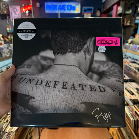 Signed cover for Frank Turner's 'UNDEFEATED'