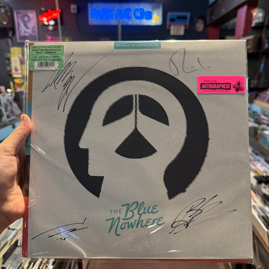 Signed vinyl copy of Between The Buried And Me - The Blue Nowhere Coke Bottle Clear 2LP